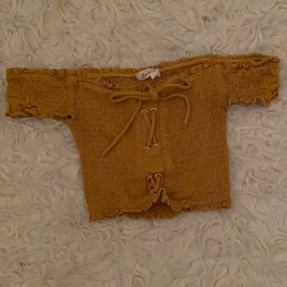 Off the shoulder yellow crop top.